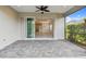 View from patio through large sliding doors to the interior of the home at 12408 Palatka Dr, Venice, FL 34293