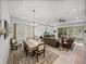 Inviting dining room features natural light and seamless flow into the living space at 14198 Thoroughbred Dr, Dade City, FL 33525