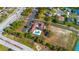 Aerial view of the community clubhouse, pool, and parking at 14296 Pullman Dr, Spring Hill, FL 34609