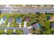 Aerial view showcases the home's location near a busy street and surrounded by well-maintained properties at 14296 Pullman Dr, Spring Hill, FL 34609