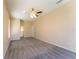 Spacious carpeted bedroom with ceiling fan and lots of natural light at 14296 Pullman Dr, Spring Hill, FL 34609