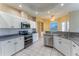 Well-equipped kitchen with stainless steel appliances, and white cabinetry at 14296 Pullman Dr, Spring Hill, FL 34609