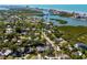 Aerial view of neighborhood and property located on the water at 14323 83Rd Pl, Seminole, FL 33776