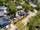 An aerial view of a home with a backyard pool and patio at 14323 83Rd Pl, Seminole, FL 33776
