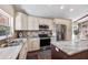 Kitchen featuring stainless appliances, granite counters, and abundant cabinet space at 14323 83Rd Pl, Seminole, FL 33776