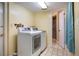 Laundry room with washer and dryer at 14323 83Rd Pl, Seminole, FL 33776
