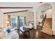 Spacious living room features wood floors, high ceilings, and large windows for natural light at 14323 83Rd Pl, Seminole, FL 33776