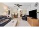 Open living room features a wet bar and lots of space for entertaining at 14323 83Rd Pl, Seminole, FL 33776
