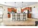 Spacious kitchen with an island, stainless steel appliances, and pendant lighting at 1564 Imperial Key Dr, Trinity, FL 34655