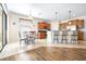 Open kitchen with stainless appliances, a breakfast bar, and an eat-in kitchen area at 1564 Imperial Key Dr, Trinity, FL 34655