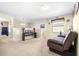 Upstairs loft area with neutral walls, carpet flooring and a window for natural light at 1564 Imperial Key Dr, Trinity, FL 34655