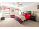Primary bedroom with ceiling fan, ample natural light from large windows, and a large bed at 1564 Imperial Key Dr, Trinity, FL 34655