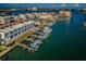 Stunning aerial view of waterfront homes with private docks and boat access in a vibrant coastal community at 161 Brightwater Dr # 8, Clearwater Beach, FL 33767
