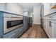 Gourmet kitchen with built-in microwave and wine fridge, providing a convenient and luxurious space at 161 Brightwater Dr # 8, Clearwater Beach, FL 33767