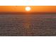 Scenic view of the ocean at sunset with the sun reflecting off the calm water at 161 Brightwater Dr # 8, Clearwater Beach, FL 33767