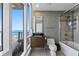Modern bathroom featuring beautiful fixtures and a serene view of the marina at 175 1St S St # 3008, St Petersburg, FL 33701