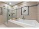 Spa-like bathroom features a soaking tub and a separate glass-enclosed shower at 175 1St S St # 3008, St Petersburg, FL 33701
