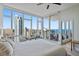 Bedroom featuring large windows, seating area, and access to an outdoor balcony at 175 1St S St # 3008, St Petersburg, FL 33701