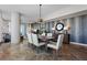 The dining room features an elegant table and chairs with unique pendant lighting at 175 1St S St # 3008, St Petersburg, FL 33701