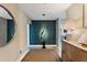 Elegant hallway featuring modern decor, textured walls, and a stylish mirror at 175 1St S St # 3008, St Petersburg, FL 33701