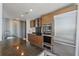 Well-equipped kitchen with stainless steel appliances and wooden cabinetry at 175 1St S St # 3008, St Petersburg, FL 33701