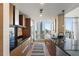 Contemporary kitchen with sleek cabinetry, granite countertops, and city views at 175 1St S St # 3008, St Petersburg, FL 33701