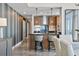 Modern kitchen with bar seating open to dining area with waterfront views at 175 1St S St # 3008, St Petersburg, FL 33701