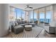 Spacious living room with modern decor, large windows, and comfortable furnishings at 175 1St S St # 3008, St Petersburg, FL 33701