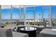 Comfortable sitting area featuring multiple chairs and expansive windows with beautiful bay and city views at 175 1St S St # 3008, St Petersburg, FL 33701