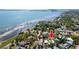 An aerial of the coastal real estate with scenic views of the beach and turquoise waters at 2019 Inner S Cir, St Petersburg, FL 33712