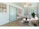 Relaxing sunroom with tile floors, plenty of natural light and a view of the backyard at 2019 Inner S Cir, St Petersburg, FL 33712