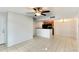 The living room boasts ample space and a seamless transition to the kitchen area at 209 Lake Brook Cir # 104, Brandon, FL 33511