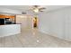 Open floor plan features kitchen with breakfast bar looking into the living area at 209 Lake Brook Cir # 104, Brandon, FL 33511