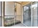 Enclosed patio featuring a sliding glass door and a view of plants at 209 Lake Brook Cir # 104, Brandon, FL 33511