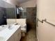 Modern bathroom features a walk-in shower, sleek vanity, and elegant fixtures at 224 Chardonnay Pl, Valrico, FL 33594