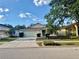 Charming single-Gathering home with a well-manicured front yard and a paved driveway at 224 Chardonnay Pl, Valrico, FL 33594