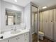 Bathroom featuring a vanity with a white countertop and a shower with a striped curtain at 2644 2Nd Ct, Palm Harbor, FL 34684