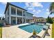 Stunning backyard with a pool, spa, covered patio, and a gazebo, ideal for entertaining at 28355 Picana, Wesley Chapel, FL 33543