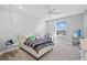 Charming bedroom featuring a cozy hanging chair and plenty of natural light at 28355 Picana, Wesley Chapel, FL 33543