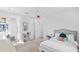 Bedroom showcasing a comfortable bed, ample natural light, and chair swing at 28355 Picana, Wesley Chapel, FL 33543