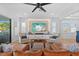 Open living room with tile flooring, fireplace and comfortable seating at 28355 Picana, Wesley Chapel, FL 33543