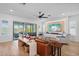 Spacious living room with coffered ceiling, fireplace and an outdoor view at 28355 Picana, Wesley Chapel, FL 33543