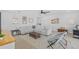 Bright living room featuring a comfortable seating arrangement and stylish decor at 28355 Picana, Wesley Chapel, FL 33543