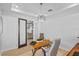 Home office space with modern lighting and wood desk at 28355 Picana, Wesley Chapel, FL 33543