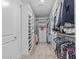 Spacious walk-in closet with custom shelving and ample storage space at 28355 Picana, Wesley Chapel, FL 33543