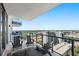 Spacious balcony with seating area and panoramic views of city skyline at 301 1St S St # 2205, St Petersburg, FL 33701