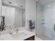 Modern bathroom features a walk-in shower, clean lines, and luxurious finishes at 301 1St S St # 2205, St Petersburg, FL 33701