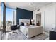 Bright bedroom featuring a dedicated workspace, accent wall, and great natural light at 301 1St S St # 2205, St Petersburg, FL 33701