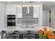 Modern kitchen with sleek countertops, island seating, and elegant lighting fixtures, perfect for entertaining at 301 1St S St # 2205, St Petersburg, FL 33701