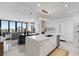 Modern kitchen features a center island, stainless steel appliances, and ample natural light at 301 1St S St # 2205, St Petersburg, FL 33701